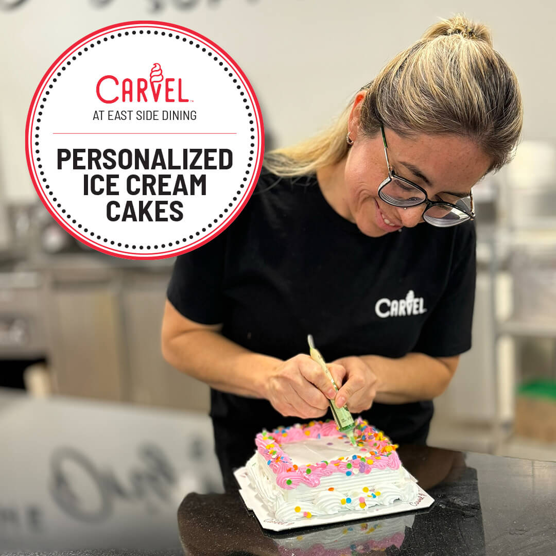 Carvel employee decorating cake