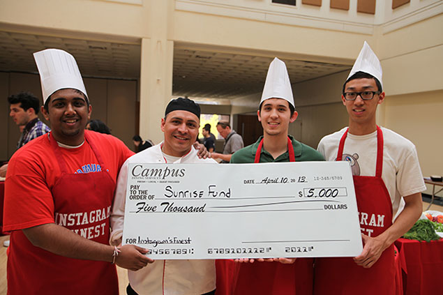 The 2013 winners of the Iron Chef Competition (pictured left to right) are Jonathan John, Campus Dining Chef Romel Velasquez, Stephen Lee and Albert Hei from Team Instagram’s Finest. Their team won $5,000 for the Sunrise Fund charity.