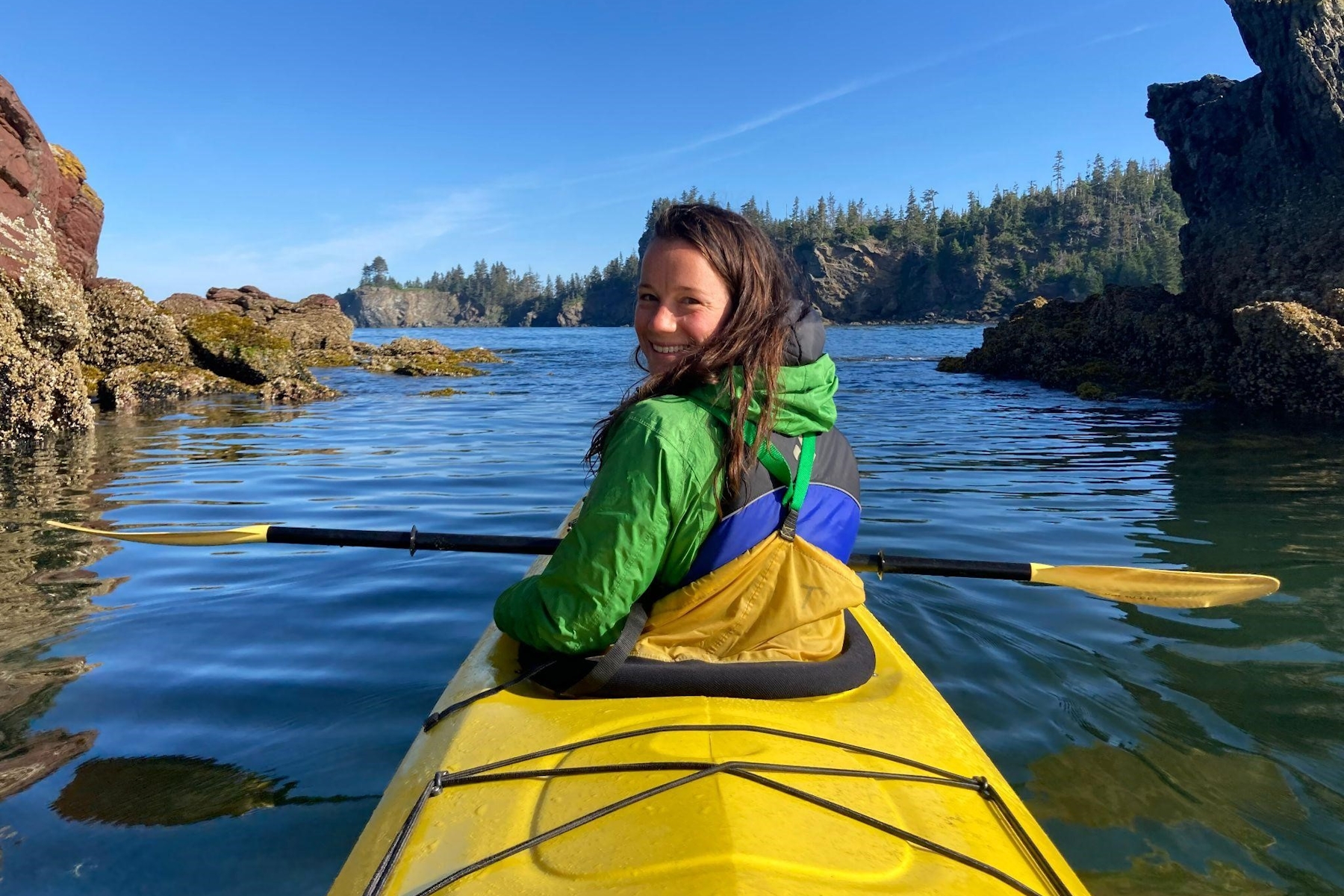 Katie Conroy paddles in a kayak