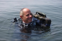 Gregg Rivara recovers something while diving